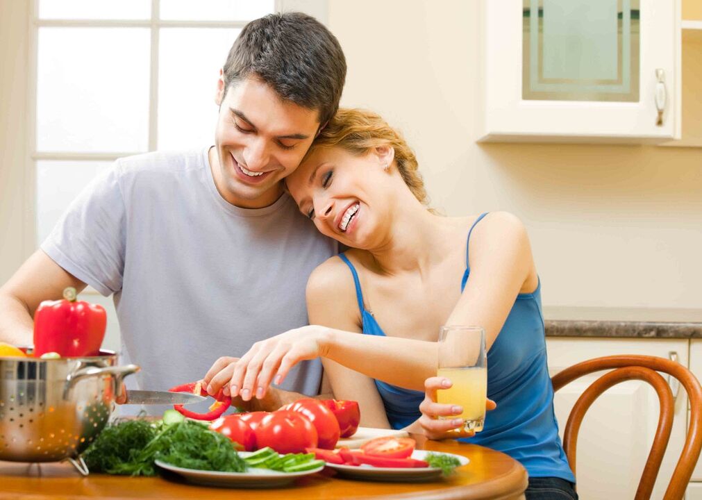 a couple preparing vegetables to increase male potency